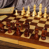 32 wooden chess pieces with 3-inch king figures